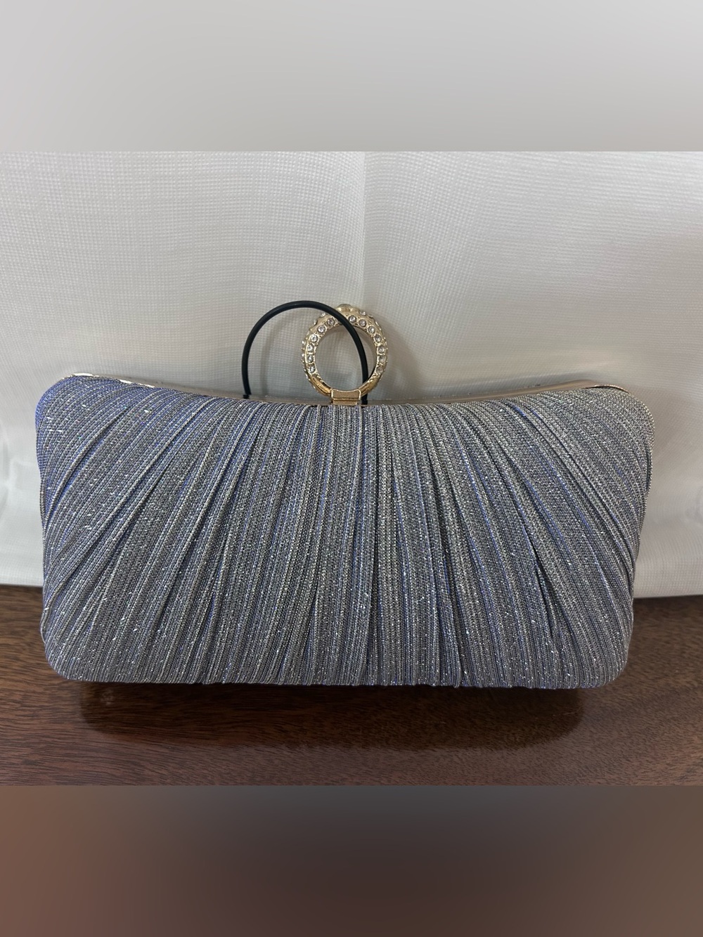 Elegant Silver and Blue Evening Clutch with Gold Crystal Ring
